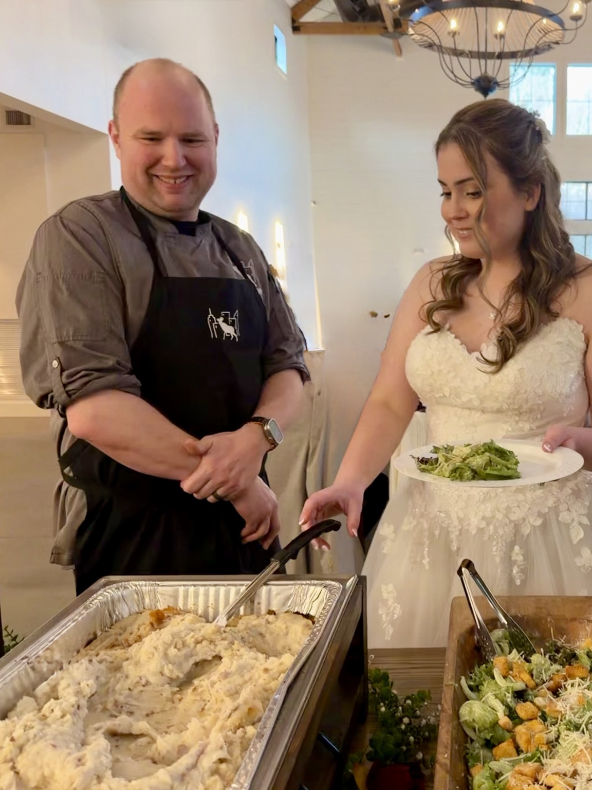 Chef Jason serving a bride at a City Moose catered wedding